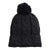 The North Face Cable Minna Pom Beanie is a black, thick cable knit beanie with a large pom-pom and folded brim, made from recycled polyester fleece. It features a small rectangular fabric tag on the brim.