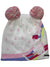 Girls knit beanie with large pom-poms, pink speckled dots, and skier artwork