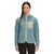 A woman with long brown hair in a side braid is wearing The North Face Women's Mountain Sweatshirt Hoodie, featuring a light blue hood and beige chest pocket, as she smiles against a white background.