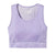 The Smartwool Womens Intraknit Racerback Bra features a lavender color, scoop neckline, wide straps, ribbed under-bust detail, and seamless stretchy fabric for comfort and athletic performance.