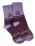 The Zoic Women's Lucy Sock is a pair of purple and lavender cushioned crew socks with mountain logo, "2ONG" near the top, and dark/light purple stripes—perfect for women cyclists seeking comfort and style.