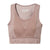 The Smartwool Womens Intraknit Racerback Bra is a mauve, sleeveless crop top with wide straps, ribbed sides, subtle pattern details, and a small white logo plus size info printed near the neckline.