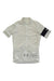 The Rapha Women's Pro Team Aero Jersey is a short-sleeved, white aerodynamic race-fit jersey with a full-length front zipper and a black band on the left sleeve displaying "RAPHA" in white text.