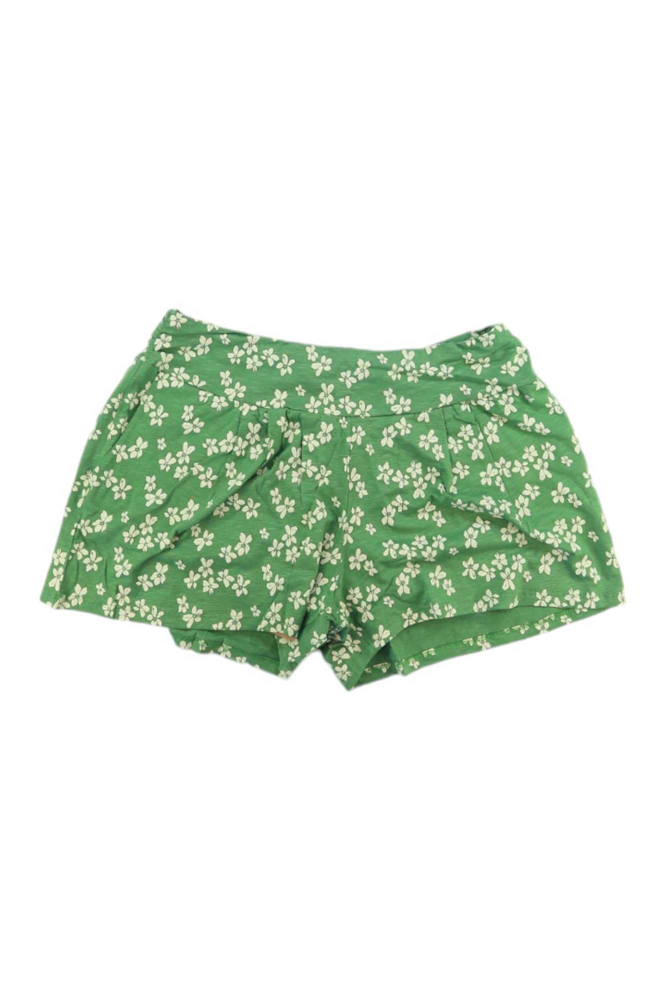The Toad & Co Women's Chaka 4 Inch Short features a white floral print, is made from organic cotton, and is shown laid flat on a white background.