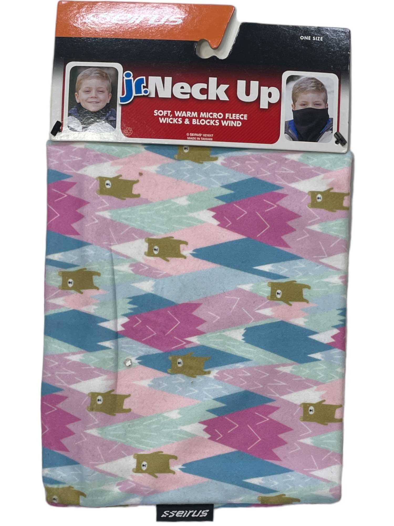 The Seirus Junior Micro Fleece Neck Up Gaiter is a colorful kids’ winter accessory with a geometric pink, blue, and white pattern plus bear illustrations. Packaging features a child model and says "Jr. Neck Up.