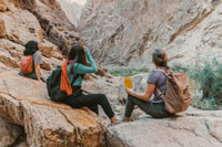 group of women resting after a hike