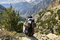 hiker viewing mountain range