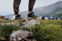 A hiker standing on a rock