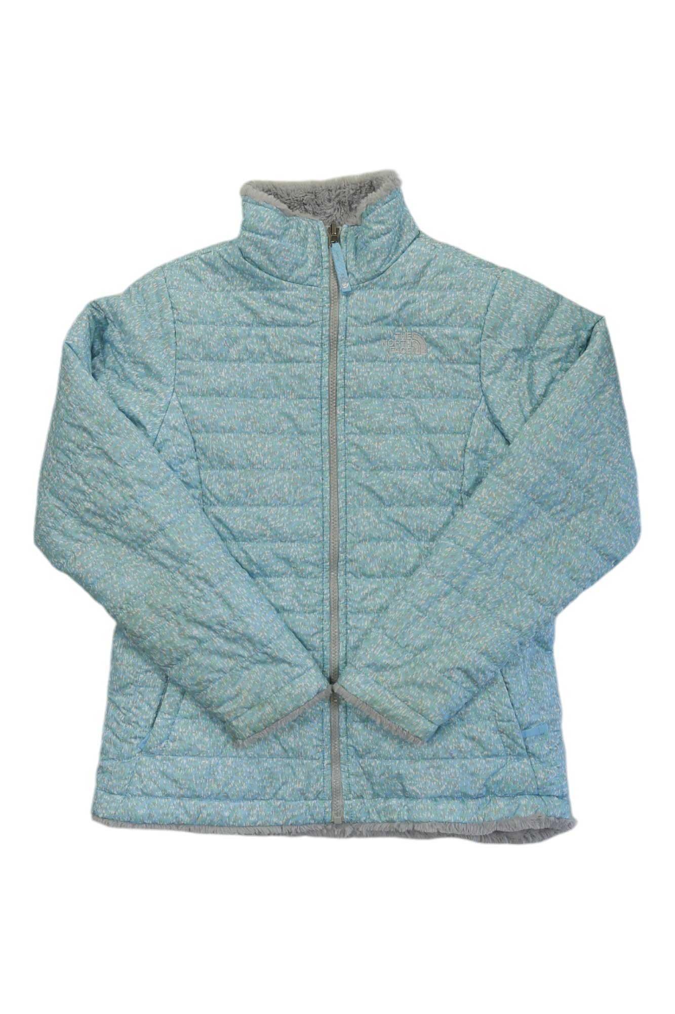 A light blue Girls Reversible Mossbud Swirl Jacket featuring quilted design, Heatseeker Eco Insulation, front zipper, high collar, and two side pockets is displayed on a white background.