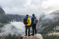 two men wearing hiking gear