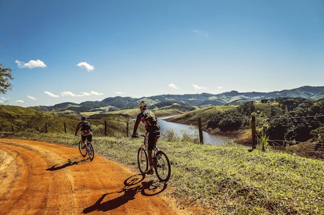 cyclists on a dirt road