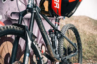 mountain bike with a helmet hanging on the handlebars