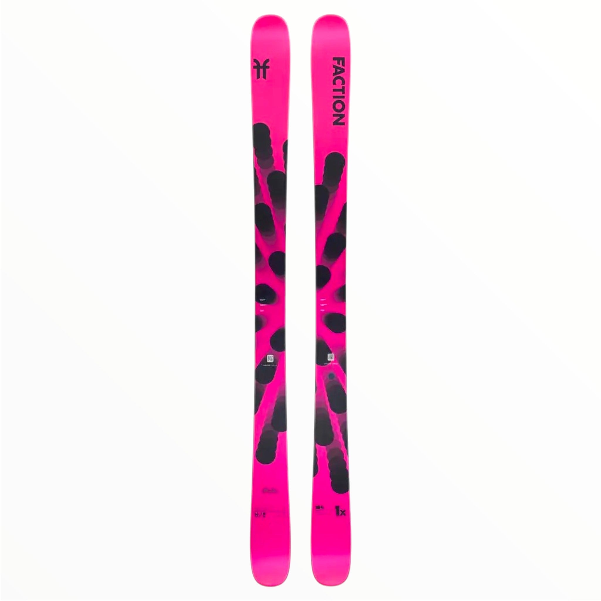 The Faction Studio 1X Skis - 2023 are bright pink freestyle skis with striking black abstract graphics and text, shown side by side on a white background; their symmetrical shape makes them perfect for the terrain park.