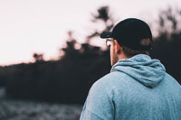 A man wearing an outdoor hat