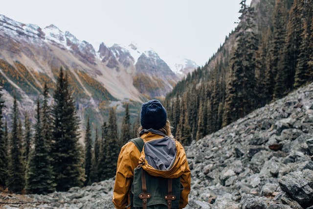 a person standing on a mountainside