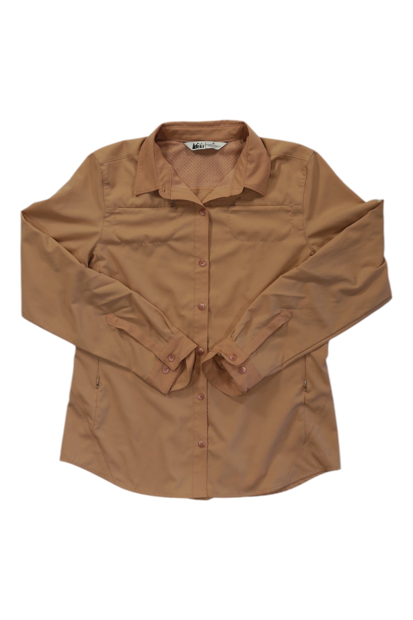 Tan women's button-up long-sleeve shirt with chest pockets and front buttons