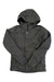 The Burton Womens Jet Set Jacket, shown in dark gray on a white background, is a waterproof insulated jacket with a front zipper, two side pockets, buttoned collar flap, long sleeves, and is made from recycled materials.