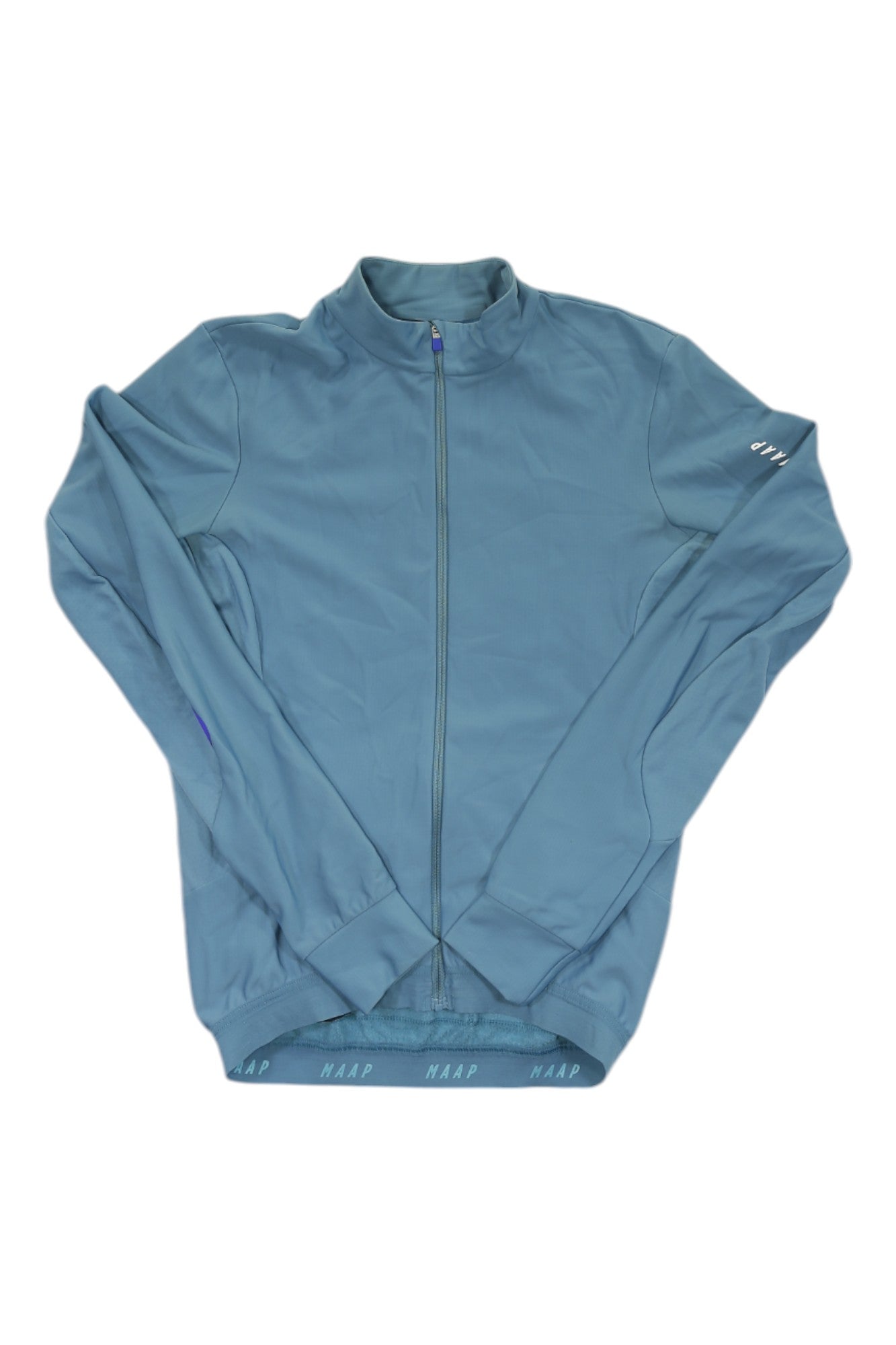 The MAAP Womens Long Sleeve Pro Fit Jersey is a blue zip-up cycling top with a stand-up collar, subtle sleeve branding, and MAAP text on the inner hem, shown laid flat on a white background.