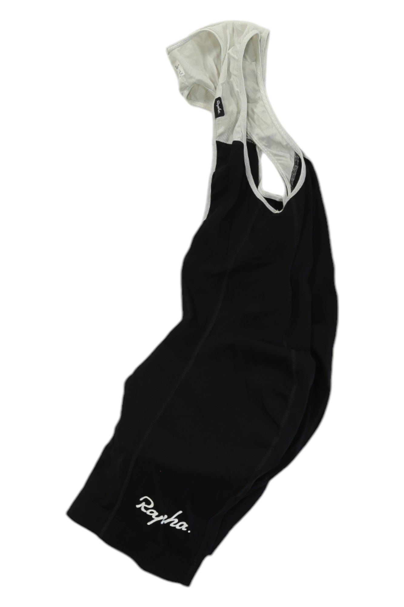 The Rapha Classic Bib Shorts in black and white, featuring shoulder straps and "Rapha." in white near the bottom hem, are premium cycling shorts designed for optimal performance.