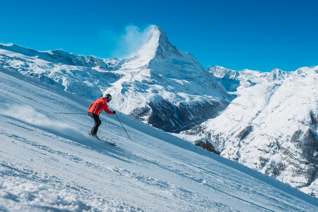 A skier on a slope