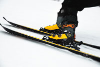 A closeup of skis and boots