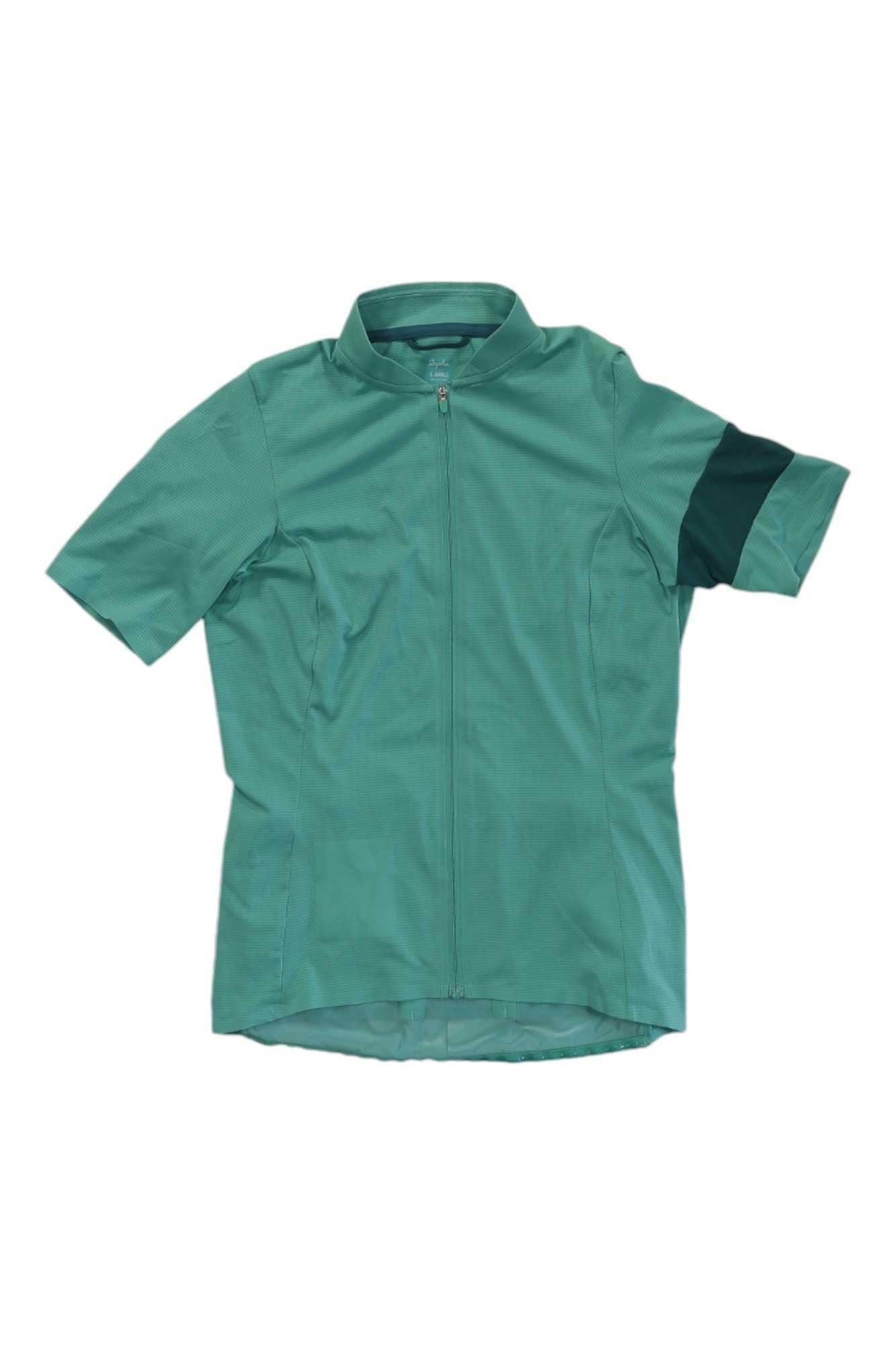 A teal Rapha Womens Classic Flyweight Jersey with short sleeves, front zipper, and a dark green left sleeve stripe is laid flat on a white background—an ideal lightweight cycling jersey for women.