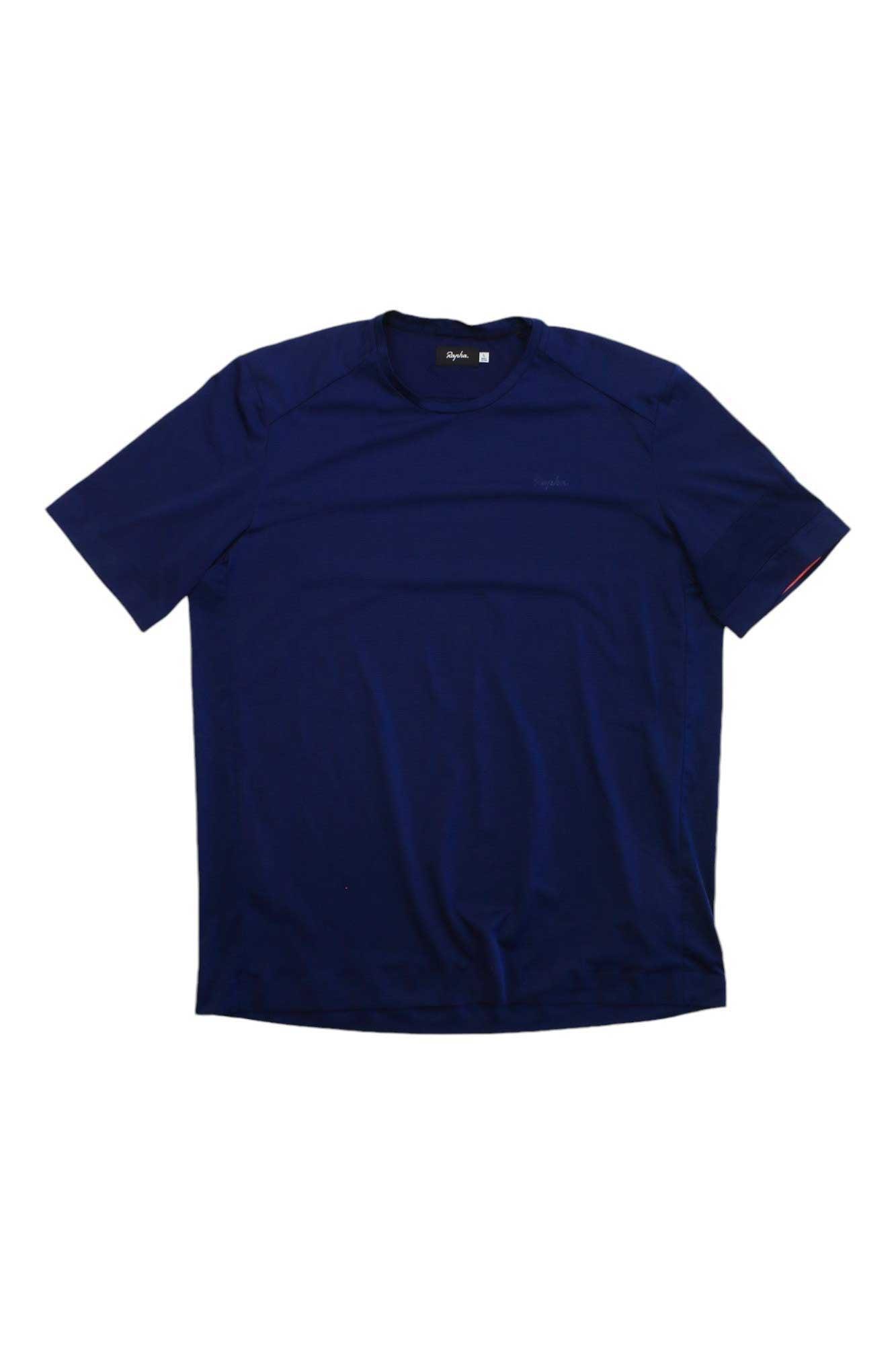 The Technical T-Shirt, a plain, short-sleeved men's dark blue top, is displayed flat on a white background—ideal adventure apparel.