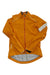 The Rapha Women's Classic Winter Jacket is bright orange with a front zipper, high collar, reflective details, and an extended back hem. It offers breathable weather protection, ideal for chilly rides.