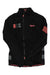 A women's black Rapha Souplesse Jacket II with a front zipper, pink RCC and Rapha logos on the chest, pink stripes on the right sleeve, and reflective grey details near the hem.