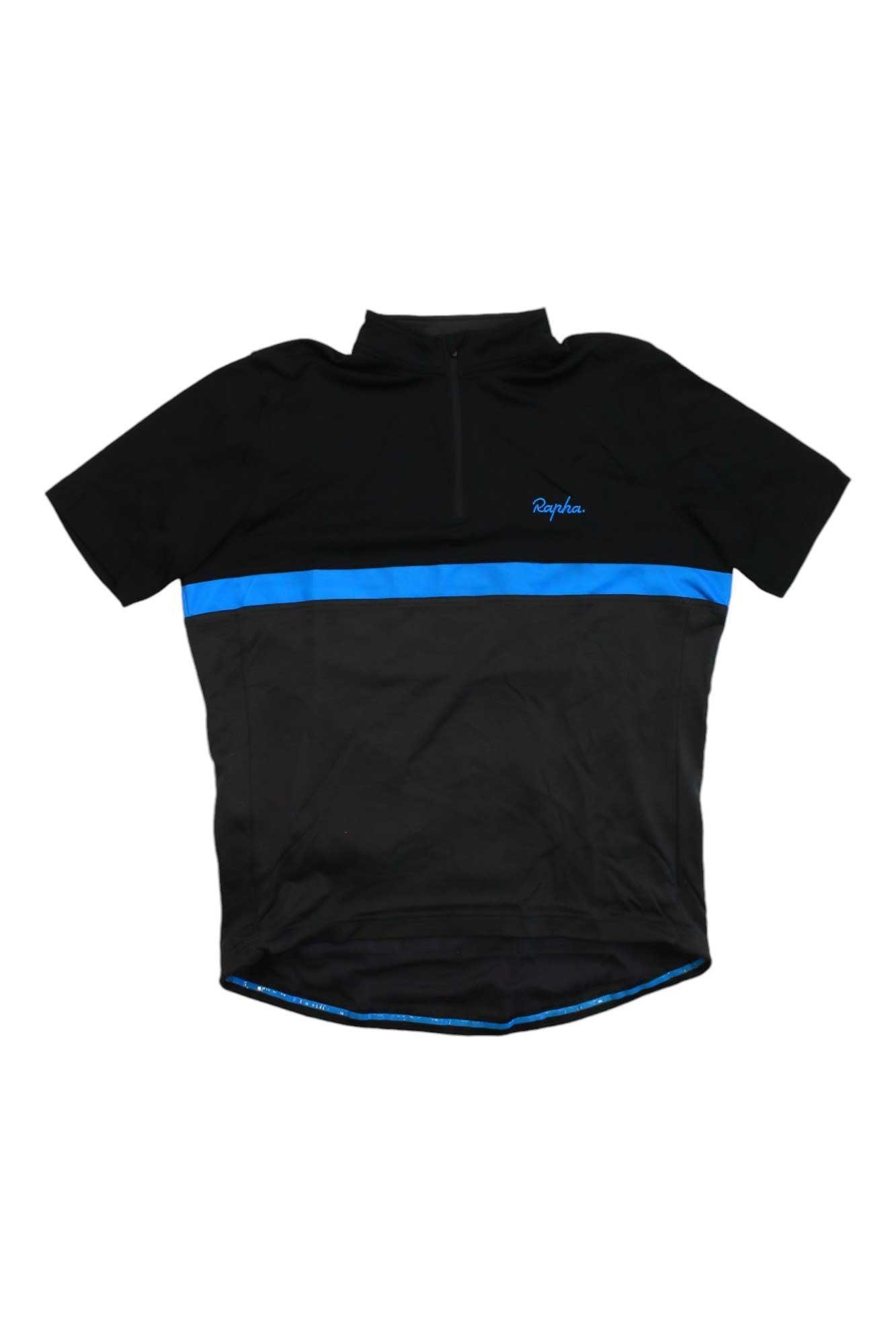 The Rapha Mens Classic Jersey is a short-sleeved black cycling top with a blue horizontal stripe, a small Rapha logo on the left, a short zip at the collar, and is made from soft merino wool for comfort and performance.