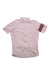 The Rapha Womens Classic Flyweight Jersey is a lightweight, short-sleeved cycling top in light pink with a darker pink left arm band, featuring a full front zipper and shown laid flat on a white background.