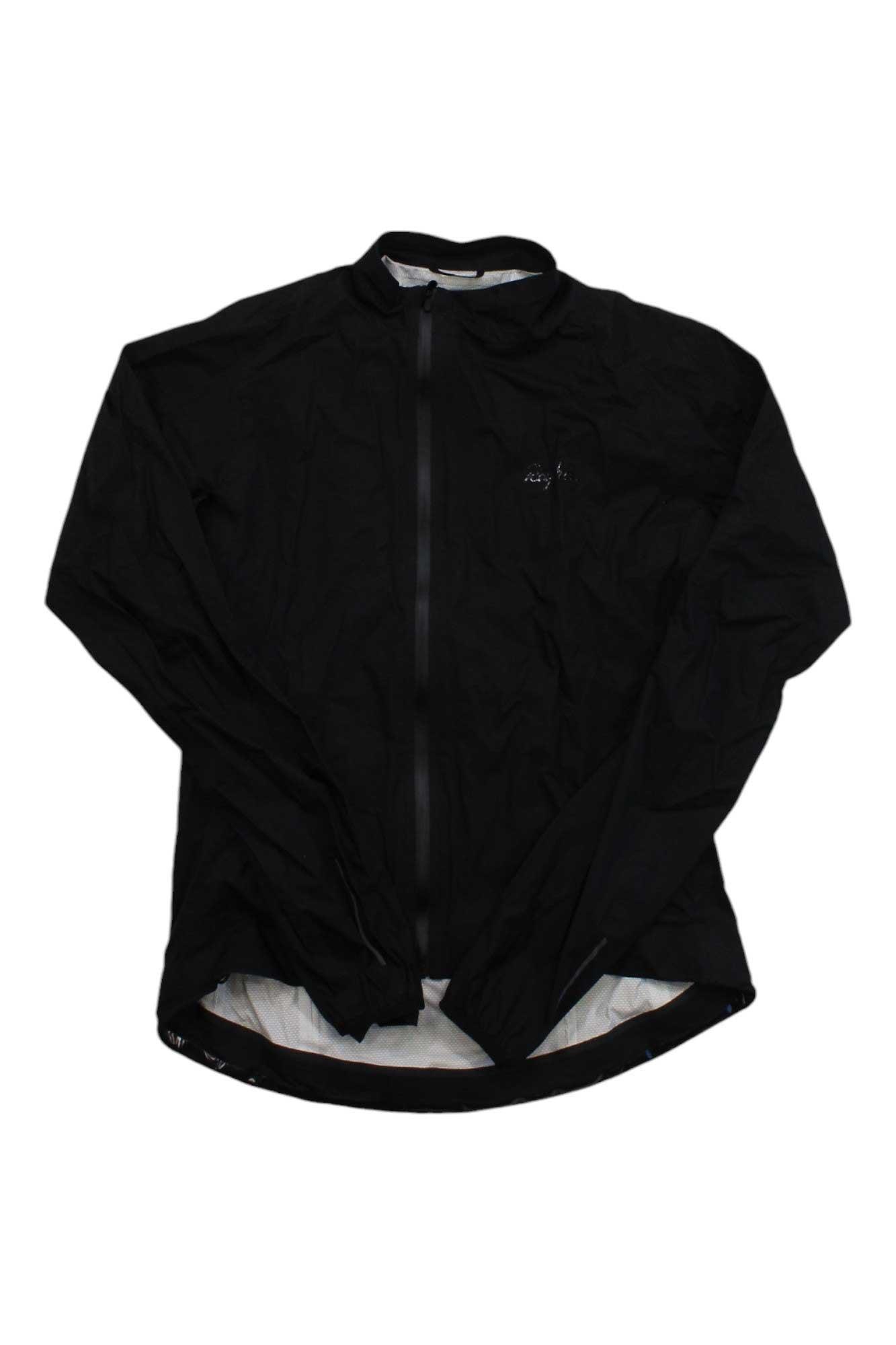 The Rapha Men's Core Rain Jacket II is a black, lightweight, long-sleeved waterproof cycling jacket with a front zipper and a subtle chest logo, shown on a white background.
