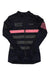The Rapha RCC Womens Pro Team Long Sleeve Jersey is a black women’s cycling top with gray and pink stripes, “RCC” on the chest, Rapha logo, pink sleeve accents, and moisture-wicking fabric for comfort.