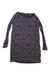 The Prana Womens Paisley Long Sleeve Dress, featuring a faux wrap style and a black, white, and pink geometric pattern, is laid flat on a white surface. It has a round neckline and appears to be made from soft, textured fabric.
