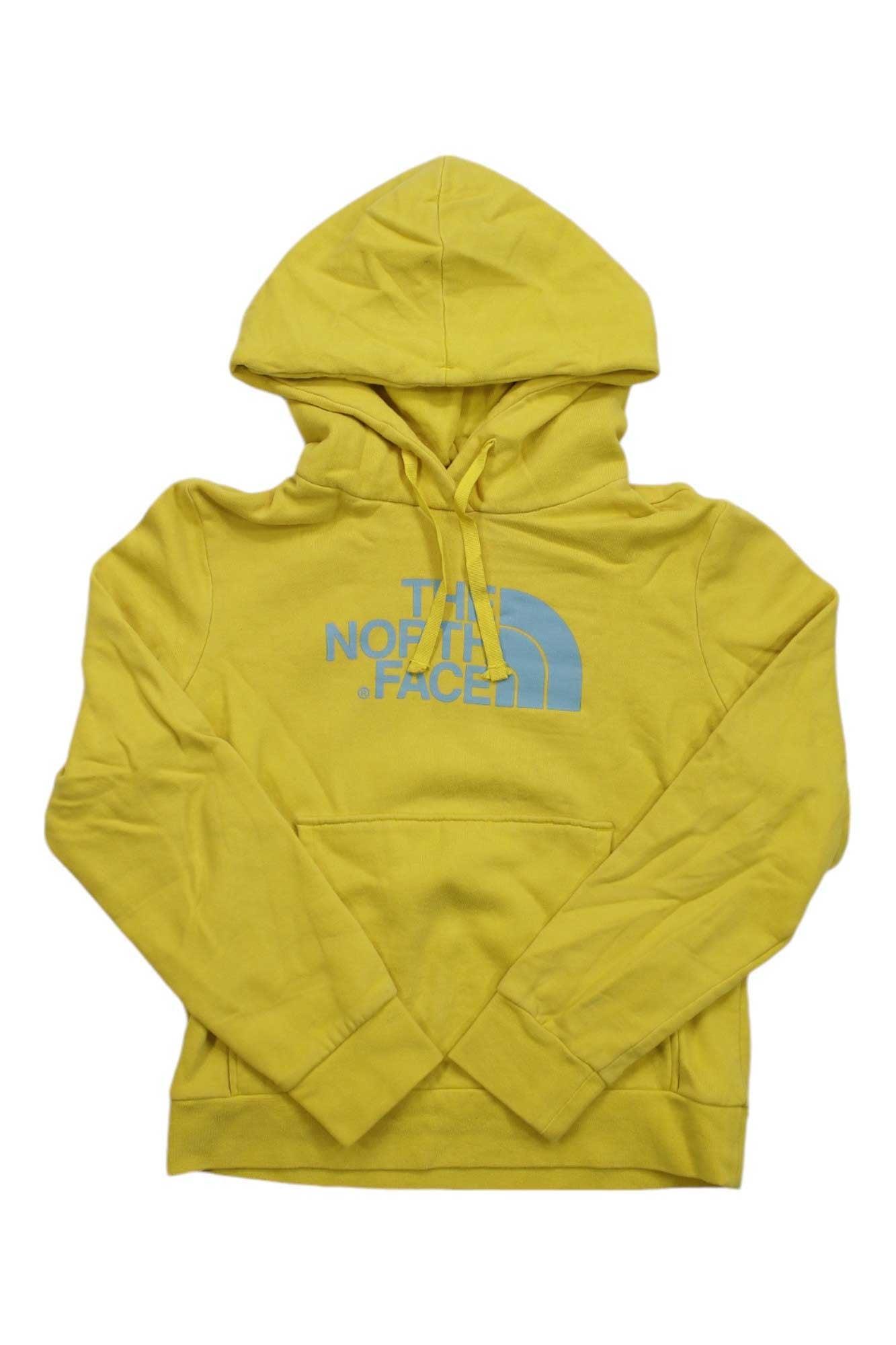 The North Face Womens Half Dome Pullover Hoodie is a yellow pullover made from a soft cotton blend, with a front pocket and light blue The North Face logo printed on the chest.