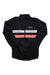 The Rapha Mens Brevet Long Sleeve Windblock Jersey is a black cycling jacket with a front zipper, white and pink horizontal chest stripes, and the Rapha logo on the left side.