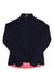 A Rapha Womens Souplesse Jacket in dark navy with long sleeves, high collar, and visible pink lining at the hem and neck. The waterproof cycling jacket is zip-up and laid flat with sleeves bent slightly inward.