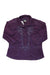 The Womens Dulce Shirt is a long-sleeved, collared purple top from Patagonia, featuring floral embroidery at the buttoned neckline, textured sustainable fabric, and is shown laid flat.