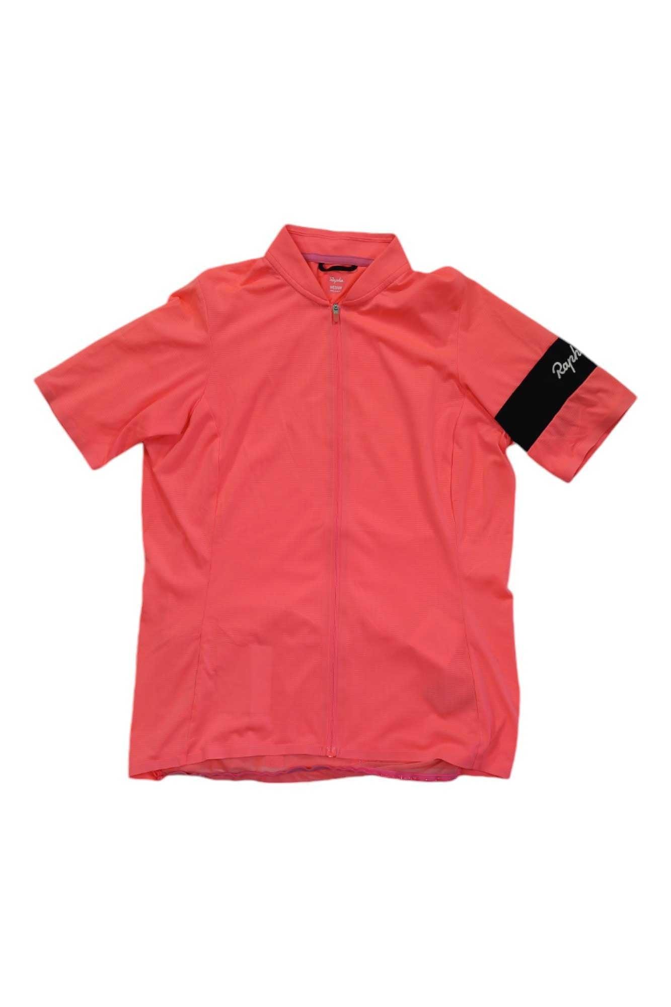 The Rapha Womens Classic Flyweight Jersey is a lightweight, short-sleeve cycling jersey in bright pink with a front zipper and black left armband featuring the white Rapha logo—ideal for warm-weather rides.