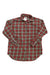The REI Womens Button Up Flannel Shirt, featuring a red, green, and white plaid pattern and sun-protective long sleeves, is shown flat on a white background.