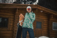 A snowboarder wearing goggles