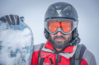 A snowboarder wearing a helmet