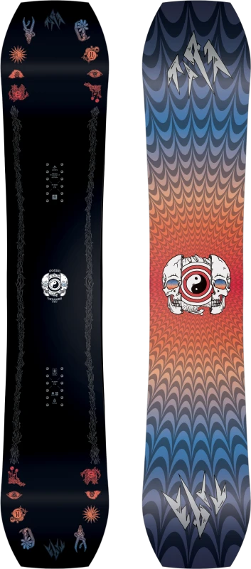 Black snowboard with ocean-wave gradient graphics and skull face print