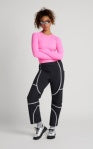 Tectonic pants in black with white side stripes and knee panels, full-length jogger fit