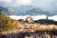 A tent overlooking mountains