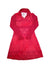 The Quarter Zip Spandex Dress is a long-sleeved, knee-length red activewear dress with a high collar, dark red designs on the lower half, and small polka dots on the sleeves and upper section.