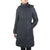 A woman wearing the Women's Miss Metro Down Parka II with a hood and hands in pockets stands against a plain white background.