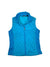 A women's sleeveless, bright blue quilted vest with front panels for extra warmth, two zippered side pockets, and a stand-up collar is displayed flat against a white background. Product name: Womens Quilted Vest.