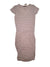 The Foundation Dress is a short-sleeve, knee-length dress with a versatile silhouette, thin light beige and dark gray stripes, side ruching, a V-neck, and made from soft TENCEL Modal. It’s shown laid flat on a white background.