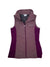 The Women's Outerspaced Hybrid Vest is a sleeveless maroon and purple vest with a zip-up front, high collar, side pockets, quilted panels, and Columbia logo on the left chest. Breathable design for comfort.